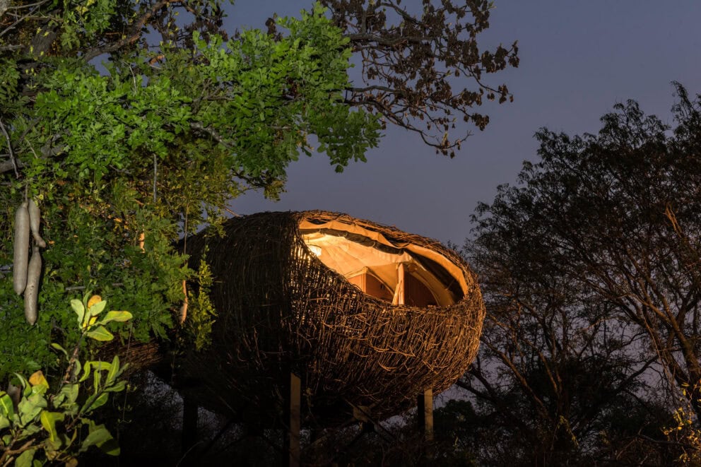 View of an elevated room shaped like a weaver bird's nest at Chisa Busanga Camp, Zambia.