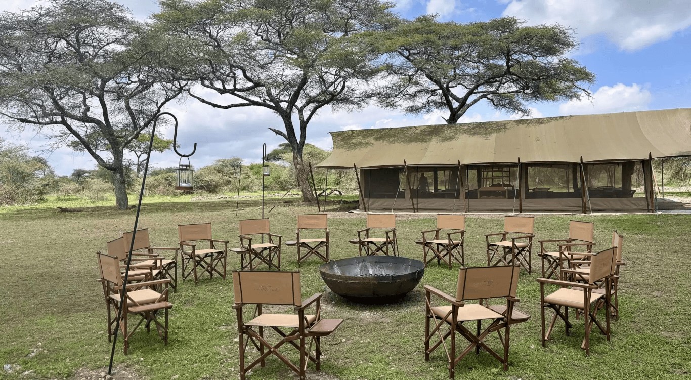 View of tents and boma at a luxury migration camp in Tanzania