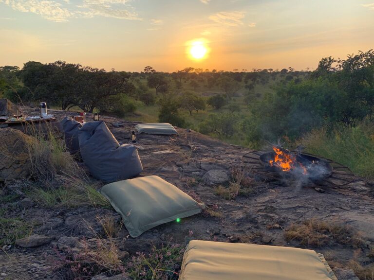 Sundowners around the fire at Nimali Mara.