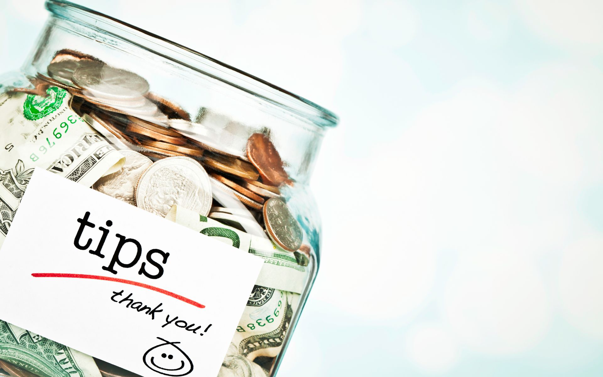 Stock image of a generic looking tip jar