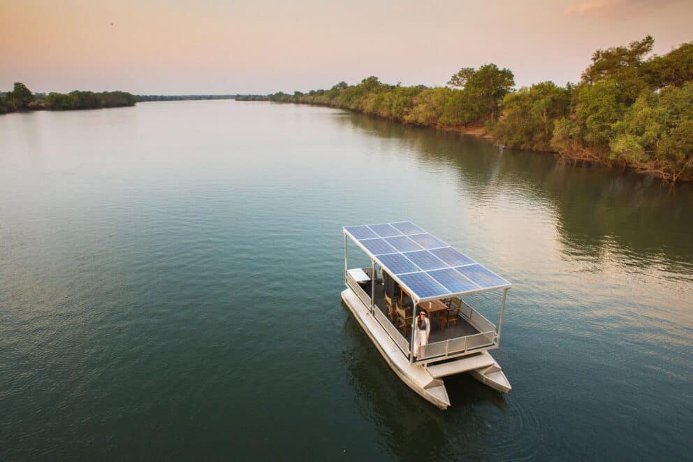 Guests enjoying an electric boat cruise on the Kafue River in Kafue National Park.