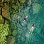 A couple snorkeling in Lake Malawi
