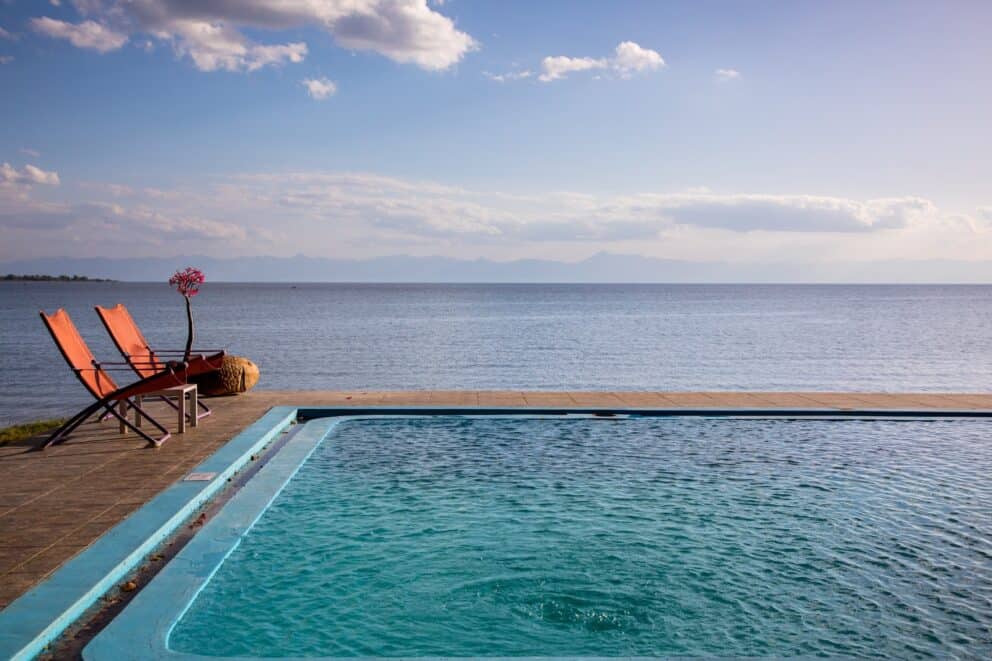 View of Lake Malawi from the pool deck at Pumulani Lodge, Malawi
