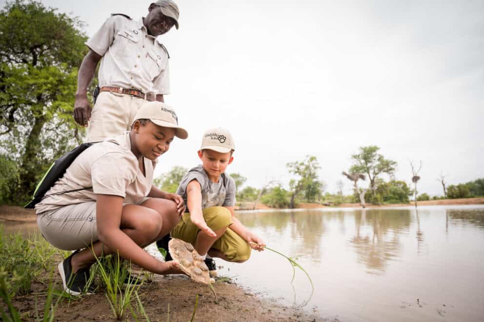Kids on a guided nature walk at Kambaku Safari Lodge, South Africa.