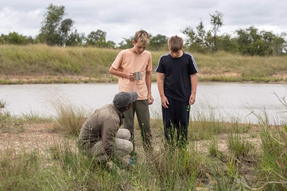 Kids on a guided nature walk at Tintswalo Manor House, South Africa.
