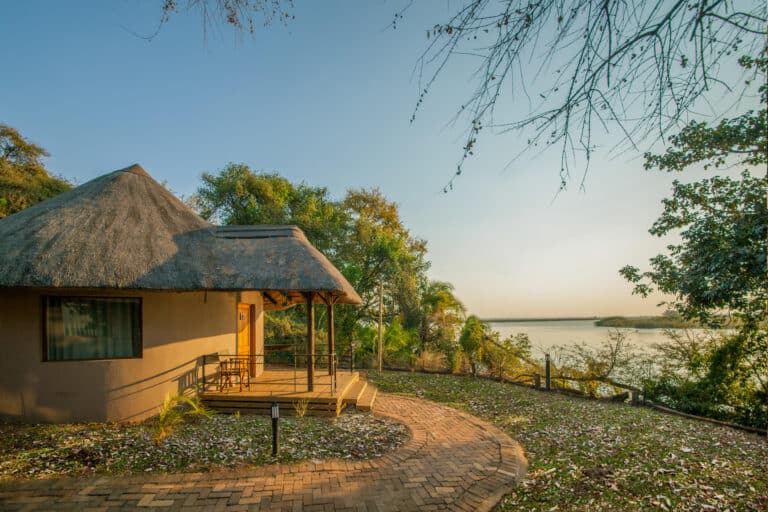 Exterior view of the luxury rondavel overlooking the Chobe River at Chobe Safari Lodge, Botswana.