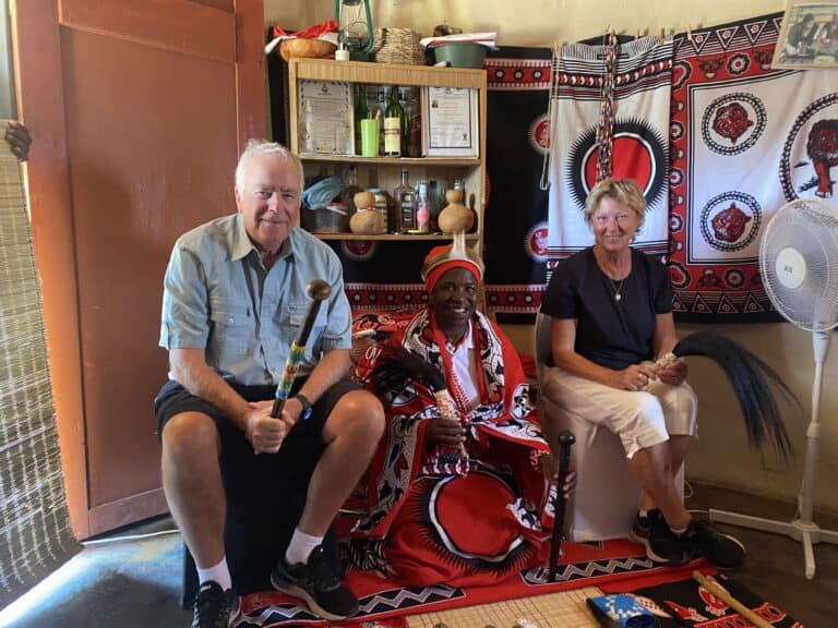 Peter and Heather photographed with a shaman in South Africa.