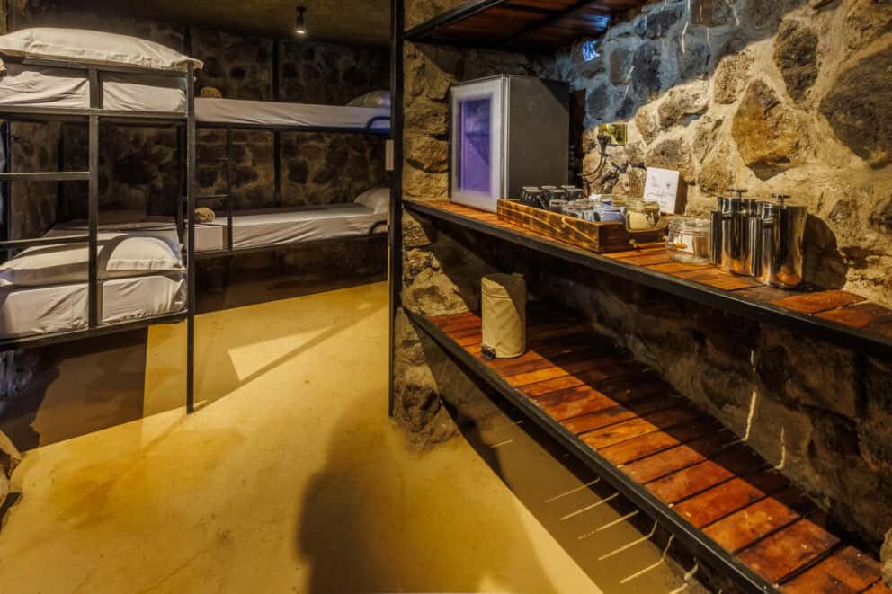 View of the bunk beds and amenities in the photo hide at Soroi Larsens Camp, Kenya.