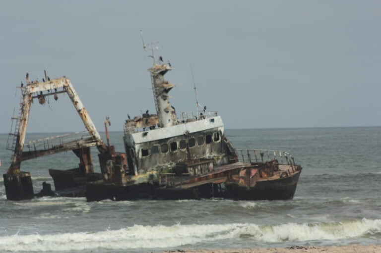 View of a shipwreck along the coast in Swakopmund, Namibia.