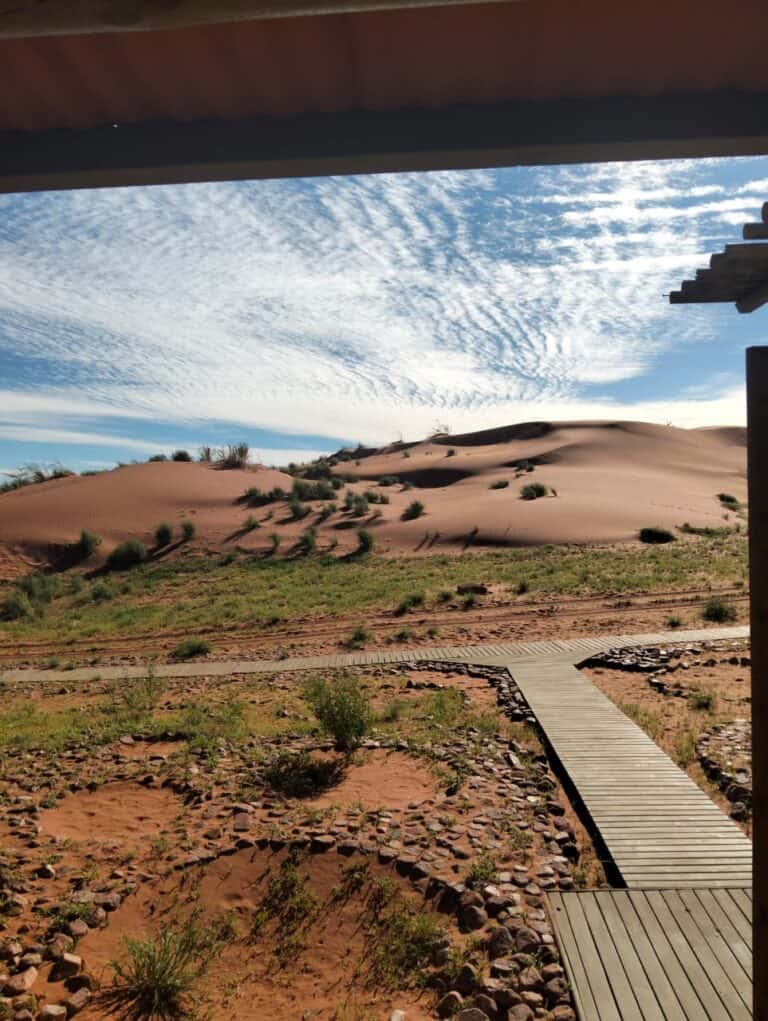 View from the private suite overlooking the desert landscape in Damaraland at Onduli Ridge, Namibia