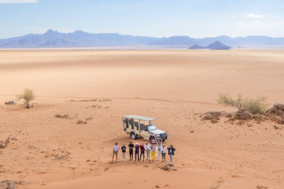 A group of people on safari in Namibia.