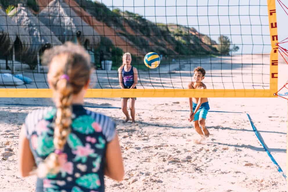 Children playing beach volleyball in Vilanculos, Mozambique.